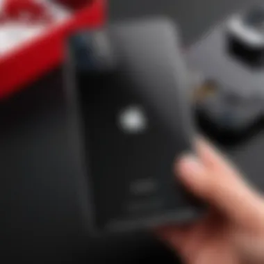 Application of Dbrand Skin User applying a dbrand skin to an iPhone 11